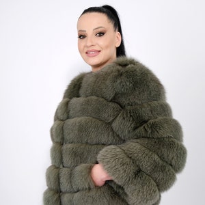 FOX FUR JACKET,Nafa furs fox jacket in tow colors green,an impressive fur for specials looks , cozy and elegant.