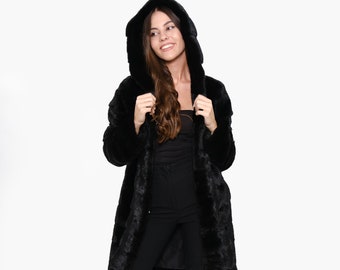 MINK FUR jacket.Saga furs auction Scandinavian mink  straight hooded jacket black velvet.Features of this model: straight silhouette .