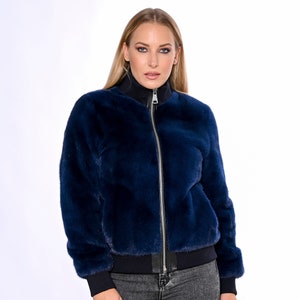 MINK FUR BOMBER,Auctioned Scandinavian deep blue mink bomber jacket from Saga Furs,an impressive fur for specials looks , cozy and elegant.