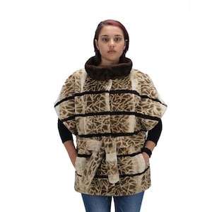 MINK FUR CAPE Saga furs auction Scandinavian mink elegant sheared fur vest in beige and brown Features of this model: straight silhouette