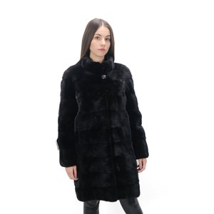 A black MINK FUR COAT,Straight coat  made of velvety North American mink Blackglama, A luxury gift ideal for a winter holiday, elegant-cozy