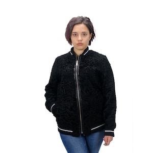 PERSIAN BOMBER JACKET, Black Persian bomber jacket from Saga Furs, The jacket is zipped along the shelves, cozy and elegant fur.