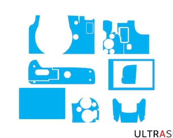 May include: A set of blue vinyl decals for a camera. The decals are designed to cover the camera's body, lens, and buttons. The decals are made from high-quality vinyl and are easy to apply and remove.