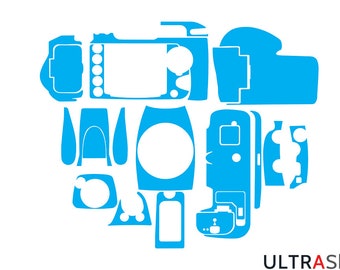 May include: A blue camera skin kit with multiple pieces for covering the camera body and lens. The kit includes a large piece for the camera body, a smaller piece for the lens, and several smaller pieces for the buttons and controls. The kit is designed to protect the camera from scratches and wear and tear.