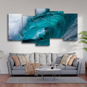 May include: A five-piece canvas print set featuring a close-up of a large, turquoise blue wave crashing. The wave is framed by white foam and the ocean water is a deep blue.