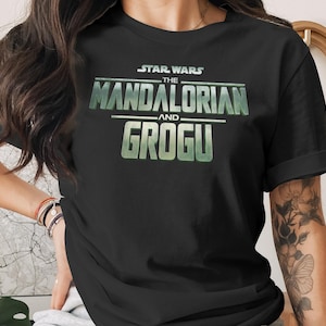 Black t-shirt with Star Wars: The Mandalorian and Grogu logo.