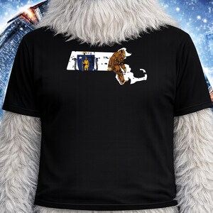 May include: A set of three ceramic mugs with a speckled, matte finish. The mugs are in shades of cream, light gray, and dark gray. Each mug has a simple, minimalist design and a rounded handle.