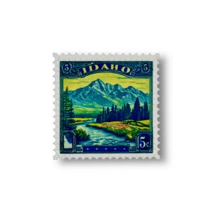 May include: A vintage 5-cent postage stamp featuring a scenic view of mountains and a river in Idaho.