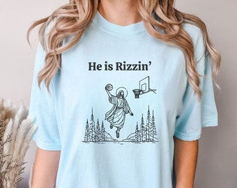 He is Rizzin' Jesus Basketball Shirt: Funny Christian Graphic Tee