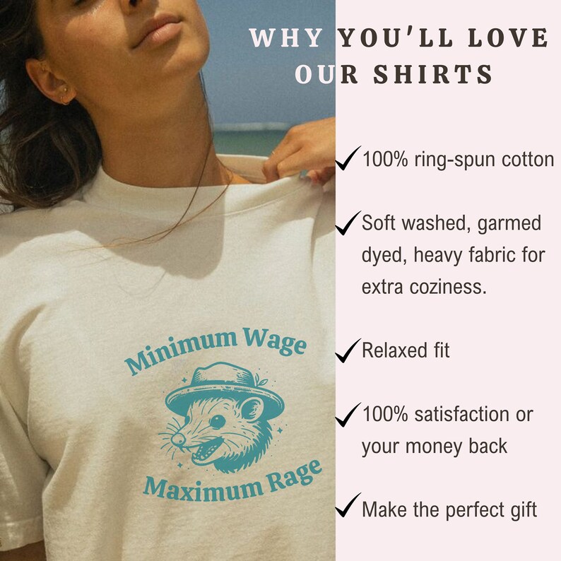 May include: A white t-shirt with a teal graphic of a possum wearing a hat and the text "Minimum Wage Maximum Rage". The shirt is advertised with a list of reasons why you'll love it, including 100% ring-spun cotton, soft washed fabric, relaxed fit, 100% satisfaction guarantee, and the fact that it makes a perfect gift.