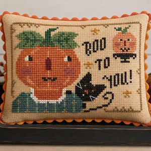 Boo To You! Pumpkin girl, vintage style jack o lantern face and black cat primitive folk art cross stitch pattern PDF by Acadia Stitchery