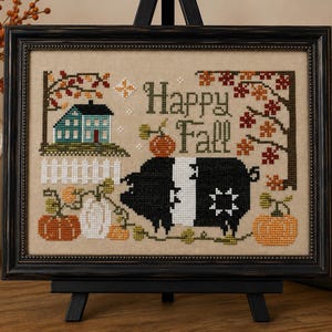Happy Fall pig in a pumpkin patch primitive folk art cross stitch pattern by Acadia Stitchery