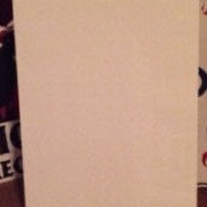 May include: Blank metal sign with two small holes in the top corners.