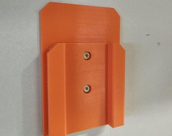 Ego battery mount to stud, made of heat-tolerant plastic