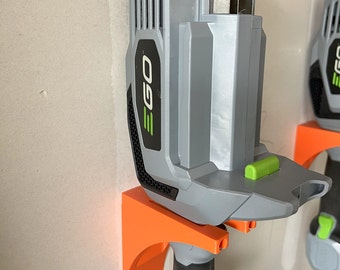 EGO power yard tool holder - robust. Holds tools and add-ons. Made in USA.