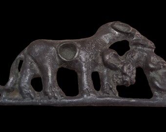 Ancient Bronze Age loin hutting Bronze Plaque Circa 1000-200 BC