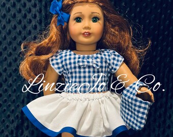 18" doll blue check top with white skirt, blue shoes, matching purse and bow