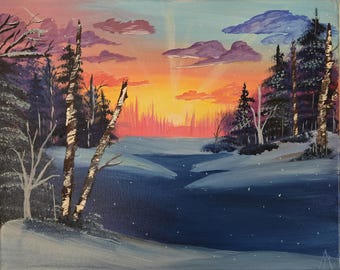 May include: An original landscape painting depicts a winter scene with a sunset. The artwork features a snowy foreground, a dark blue river, and a backdrop of trees and a colorful sky with orange, pink, and purple hues. The painting is framed.