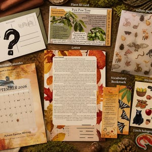 May include: A collection of stationery items including a postcard with a question mark, a Paw Paw tree plant ID card, a vellum paper sheet with forest illustrations, a September 2026 calendar, a letter on autumn leaf paper, a vocabulary bookmark, and a sticker sheet.