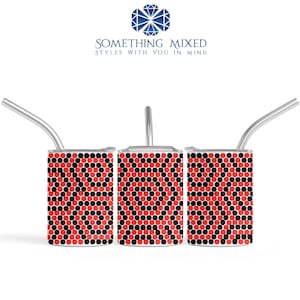 May include: Three square metal cups with a red and black dot pattern and silver straws. The cups have the text "SOMETHING MIXED STYLES WITH YOU IN MIND" at the top.
