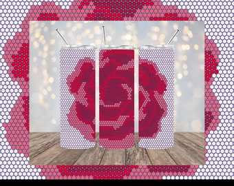 Puede incluir: Tres vasos de acero inoxidable con un diseño de rosa rosa y roja. Los vasos están sobre una superficie de madera.