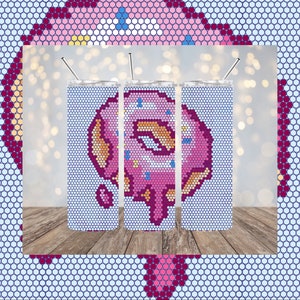 May include: Three stainless steel tumblers with a pixelated donut design. The donuts are pink with white frosting and sprinkles. The tumblers are on a wooden surface.