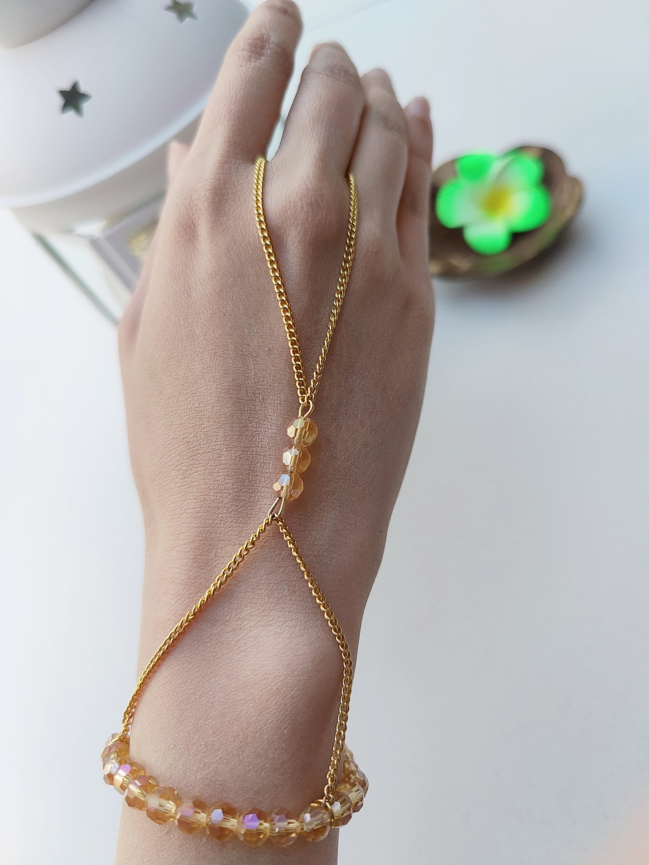 Hand chain 2024 designs in gold