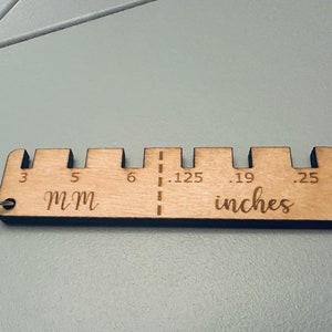 Material thickness gauge file