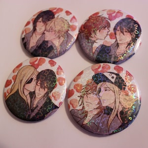 May include: Four round buttons with a white background and a pattern of red hearts. Each button features a different image of two men embracing, with a holographic effect.
