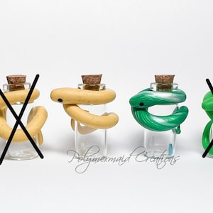 Snek hugging bottle - miniature polymer clay snake figure