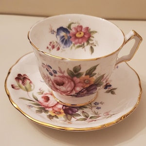 Vintage Aynsley Tea Cup and Saucer White Floral Blue Pink and Purple Flower, amazing condition with gold border Beautiful Antique Teatime