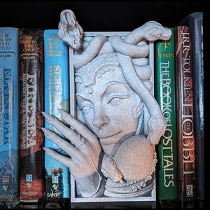 Enchanting Medusa Book Nook: Mesmerizing fantasy horror scene with snakes, books, and captivating details. Dark-themed bookshelf decor. 3D printed.