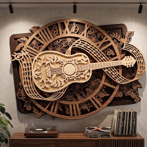 May include: A multi-layered wooden wall art piece featuring a central acoustic guitar surrounded by a circular clock face with Roman numerals, intricate floral cutouts, and flowing musical staff lines with notes, finished in light and dark wood tones.