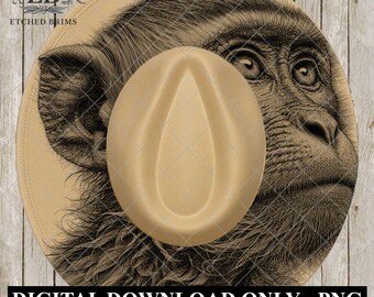 May include: A tan fedora hat with a detailed illustration of a monkey's face on the brim. The hat has a teardrop crown and a wide brim. The text "ETCHED BRIMS" and "DIGITAL DOWNLOAD ONLY - PNG PREMIUM FILE" are visible.