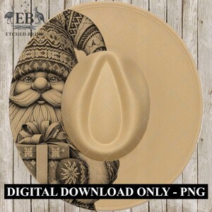 May include: Tan fedora hat with a Santa Claus graphic on the side. The Santa graphic is in sepia tones and features a detailed illustration of Santa holding a gift. The hat has a wide brim and a teardrop-shaped crown. The text "DIGITAL DOWNLOAD ONLY - PNG" is at the bottom.