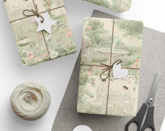 May include: Several wrapped gifts with a garden scene design, tied with twine and adorned with white star and heart-shaped tags. A ball of twine, scissors, and additional tags are also present, suggesting a gift-wrapping theme.