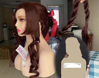 May include: A brown wig with long, wavy hair and a red ribbon. The wig is displayed on a mannequin head. The text "BAG COS" is visible on a tag attached to the mannequin.