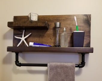 Bathroom shelf with towel rack