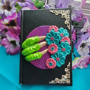 Polymer clay journal/sketchbook dragon claw and flowers