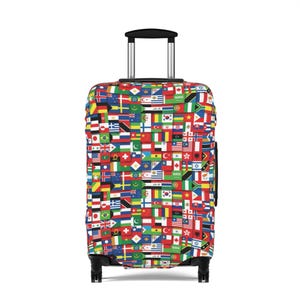 May include: A black suitcase with a colorful pattern of flags from around the world. The suitcase has a retractable handle and four wheels.