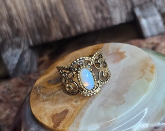 Vintage Sarah Coventry faux opal open lace ring.