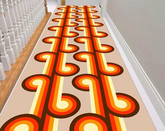 May include: A retro-style runner rug with a repeating pattern of brown, orange, and yellow curved lines on a beige background. The rug is placed on a staircase, adding a pop of color and a vintage aesthetic to the hallway.