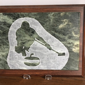 Curler releasing - hand-etched on Canadian Soapstone