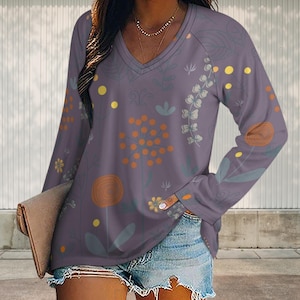 Top de manga larga con cuello en V y estampado floral estilo bohemio: Suave y de corte holgado.