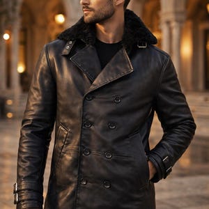 May include: Black leather double-breasted coat with a faux fur collar. The coat features multiple buttons, a notched lapel, and a tailored fit. The sleeves have buckle details. The coat is part of the premium apparel collection.