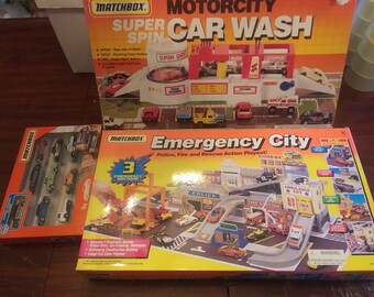 Matchbox MotorCity Super Spin Autowasch- und Notfall-Stadtpolizei, Feuerwehr- und Rettungsspielsets, Autos