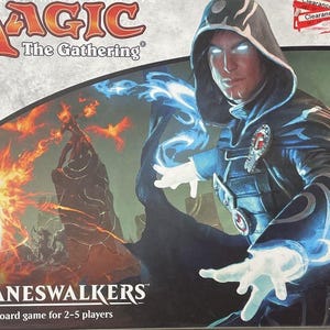May include: Box art for "Magic: The Gathering - Arena of the Planeswalkers" board game. The box features a wizard with glowing eyes and blue energy. Includes miniature figures of Gideon, Jace, Liliana, Chandra, and Nissa. Ages 10+.
