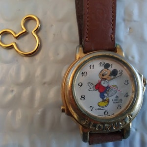 Walt Disney Mickey Mouse Watch by Lorus with leather band plus a charm (offers)