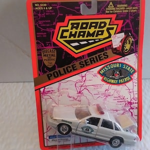 Vintage Washington State Highway Patrol police squad car die-cast vehicle, 1/43rd scale, IOP
