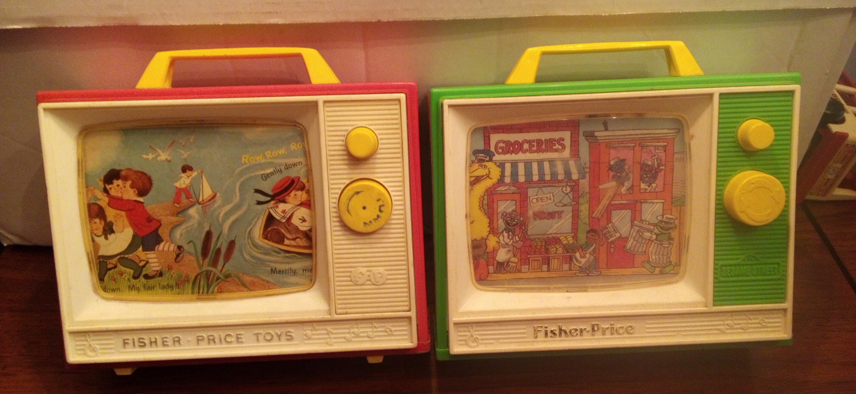 2 Vintage Fisher Price Wind-up Musical TV Toys - One Sesame Street